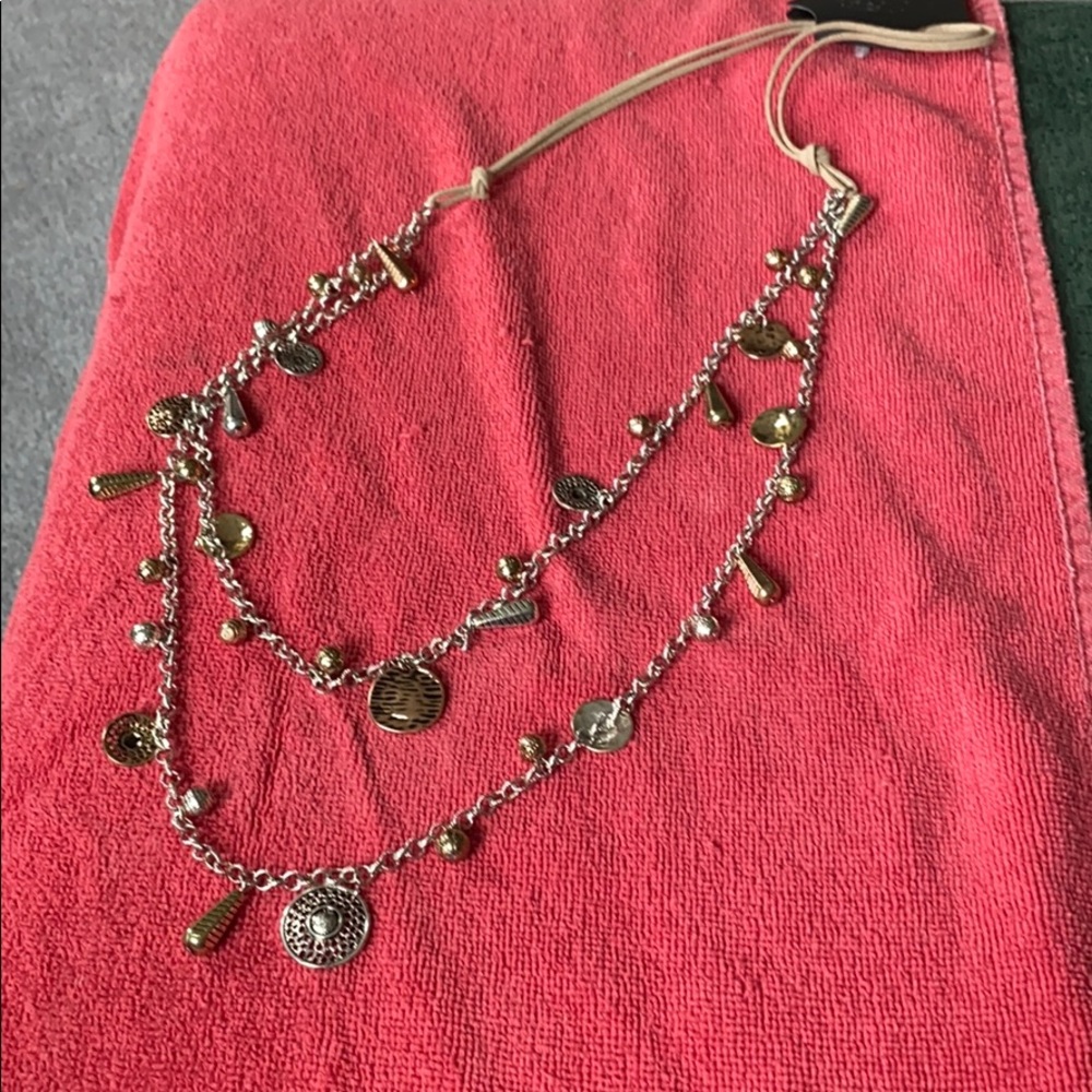 Long silver gold and bronze necklace